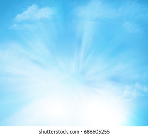 Sky background with clouds and rays of light