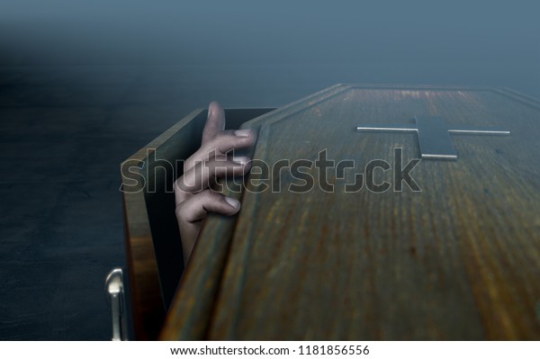 A slightly open empty\
wooden coffin with a hand reaching out on a dark ominous background\
- 3D Render