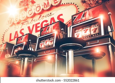 Slot Machine Games In Las Vegas Concept. Vegas Gambling 3D Render Illustration. Row Of Slots Machines And Vegas Sign In The Background.