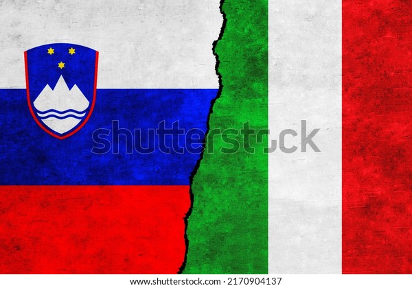Slovenia and\
Italy painted flags on a wall with a crack. Italy and Slovenia\
relations. Slovenia and Italy flags\
together