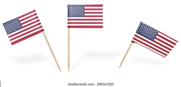 Small cocktail flags of USA in different positions isolated on white.(series) . Also easy to use as a design element :) 