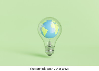 Small Round Planet Earth With Continents And Blue Oceans In Glass Light Bulb Placed On Clean Green Background In Studio. 3d Rendering