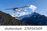 Small single-engine plane flies over snowy mountain forest with blue sky and BC Canada background, 3d Rendering.
