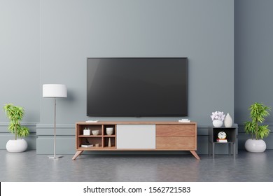 Smart TV On The Dark Blue Wall In Living Room,minimal Design,3d Rendering