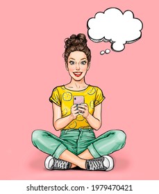 Smiling young sexy woman  sitting with smartphone. Pop Art girl using mobile phone application. Texting, communication, cellphone App concept
