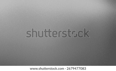 A smooth, silver textured background with a subtle gradient. The grainy surface creates a modern and abstract feel, perfect for minimalist design.
