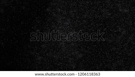 Snowfall on a black background