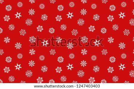 Snowflakes seamless pattern on red color background for wallpaper and gift wrapping paper.