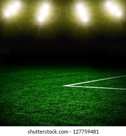 Soccer ball on the green field - Shutterstock ID 127759481