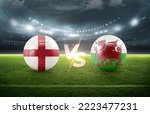 Soccer Football ball 3D with england vs Wales flags match on green soccer field