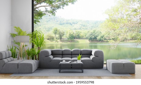 Sofa On Wooden Floor Of Large Living Room In Modern House Or Luxury Hotel. Minimal Home Interior 3d Rendering With Sky And Lake View.