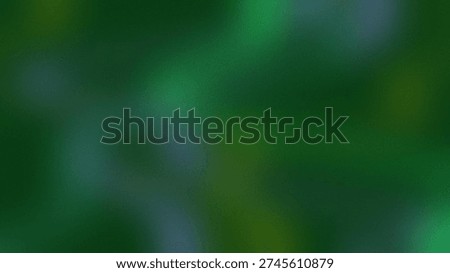 A soft abstract background featuring a deep emerald green gradient with subtle blurred areas of lighter greens and hints of blue. The defocused effect creates a natural bokeh look perfect.
