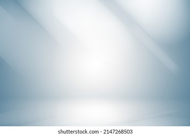 Soft blue studio room background with window with light from window, without any textures used for background and display your product.