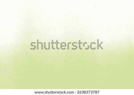 Soft gradient background with a light green and white blend. The background has a smooth texture, with green fading into white. Green textured paper background with copy space.