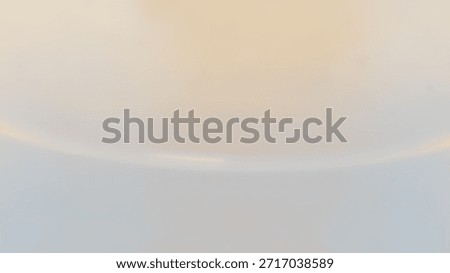 Soft white abstract background with subtle warm lighting and smooth gradients.