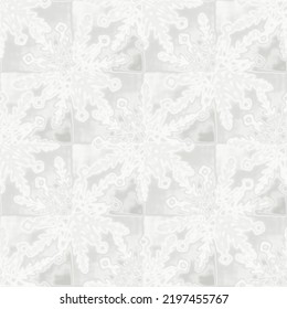 Soft white on white snow flake pattern background. Simple minimal ice blur effect seamless backdrop. Festive cold holiday season wallpaper tile. 
