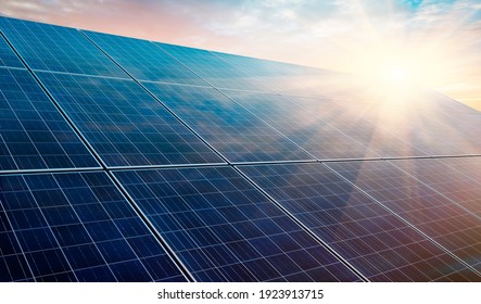 Solar panels at sunset - 3D illustration - Powered by Shutterstock