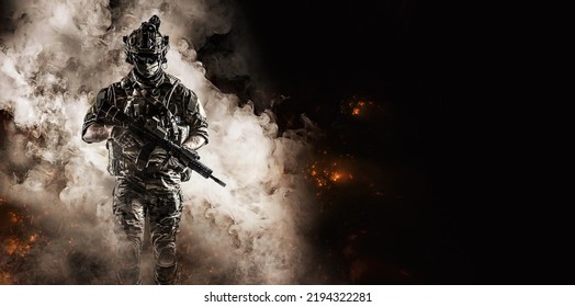 Soldier Fighter Comes Out Of The Smoke On The Battlefield. United States Military Special Operations. Computer Games.