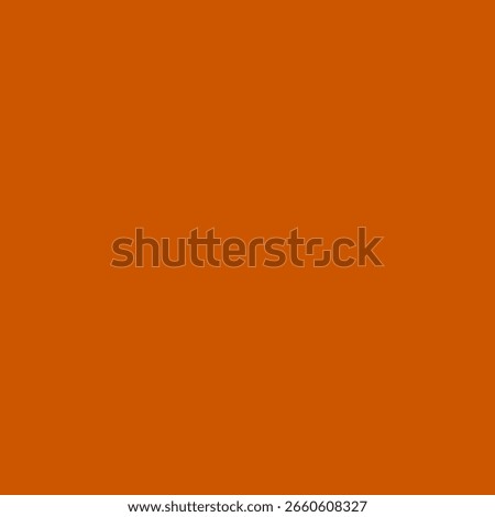Solid burnt orange color background. Warm and earthy tone ideal for autumn, retro, or rustic design themes.