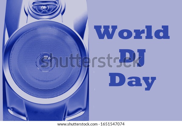 Sound speaker with copy space on a\
blue isolated background. International dj\
day.