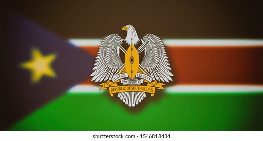 South Sudan Coat Of Arms, Flag Blurred In The Background.