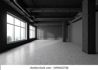 Spacious Empty Office In Industrial Style With Dark Gray And Geometric Pattern Walls, Concrete Floor, Columns And Large Windows With Mountain View. 3d Rendering