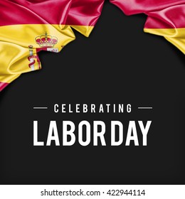 Spain Abstract waving Flag and Plain background with Typography Celebrating Labor Day 1st May