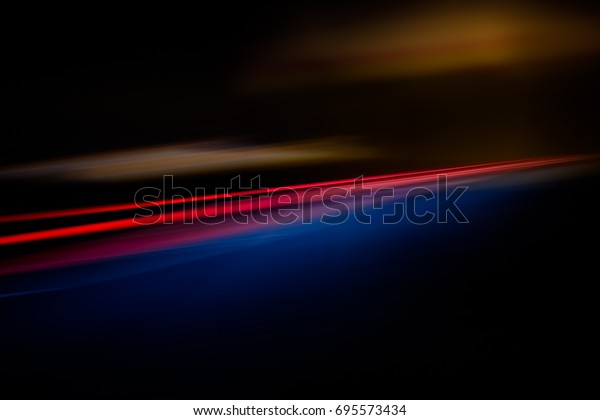 SPEED LIGHT BACKGROUND, RED\
AND BLUE LIGHT VELOCITY LINES ON DARK, EMPTY ROAD, TRAFFIC IN NIGHT\
CITY