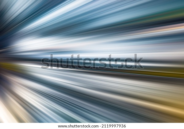 SPEED MOTION TRAILS,\
BLURRY LINES ON THE HIGHWAY ROAD OF VEHICLE MOVING FAST,\
TRANSPORTATION\
BACKGROUND