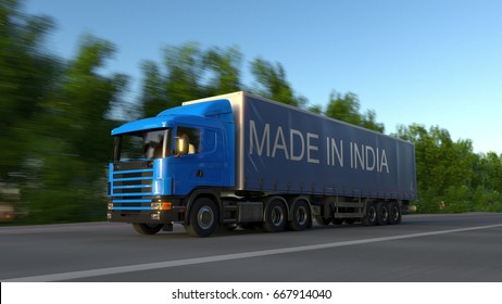 Speeding Freight Semi Truck With MADE IN INDIA Caption On The Trailer. Road Cargo Transportation. 3D Rendering