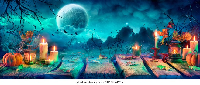 Spooky Halloween Table With Candles And Pumpkins At Night With Full Moon - Contain 3d Illustration
