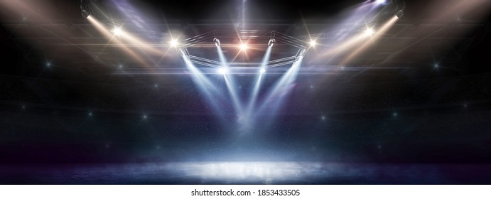 Sport Background. Winter. Blue Ice Floor Texture And Mist. Snow And Ice Background. Empty Ice Rink Illuminated By Spotlights. Scene Illumination. Colorful. 3D Rendering