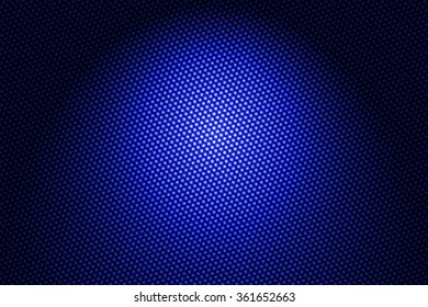 Spotlight On Blue Carbon Fiber Background.