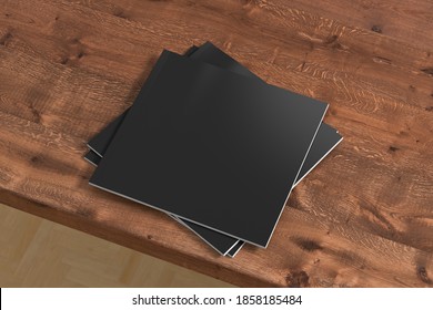 Square Black Magazine Or Brochure Stack Mockup On Wooden Table. 3d Illustration