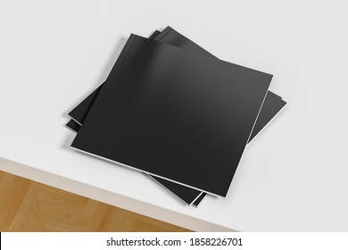 Square Black Magazine Or Brochure Stack Mockup On White Table. 3d Illustration