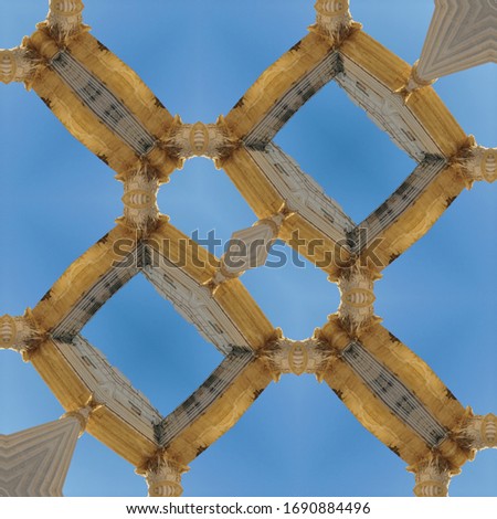 square format patterns and designs from replica roman columns at Mersin turkey against blue cloudless sky