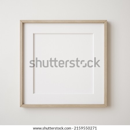 Square frame mockup close up on wall painted beige color, 3d render