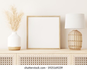 Square Poster Art Mockup With Beige Wooden Frame, Dried Grass In Vase, Wicker Basket Lamp On Empty Warm White Background. Japandi Interior Decoration. 3d Rendering, Illustration.