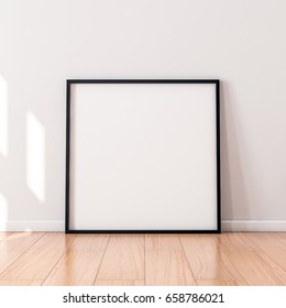 Square Poster With Black Wooden Frame Mockup Standing On The Floor. 3d Rendering