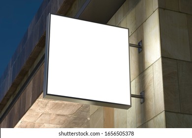 Square Signboard Or Signage On The Marble Wall With Blank White Sign Mock Up. Night Scene. Bottom View. 3d Illustration