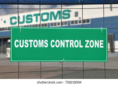 St. Petersburg, Russia - July 27, 2017: Warehouse of the customs logistics terminal behind the fence with a green sign, customs control zone.