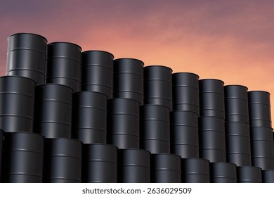 A stack of black barrels are piled on top of each other. The barrels are black and are stacked in a pyramid shape