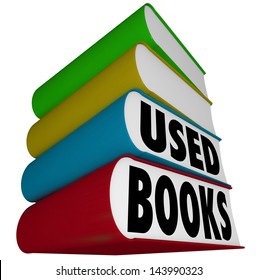A stack of books with the words Used Books to illustrate a sale of old textbooks, novels, cookbooks, encyclopedias or other publications