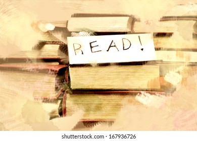 Stack of old books with a sign 