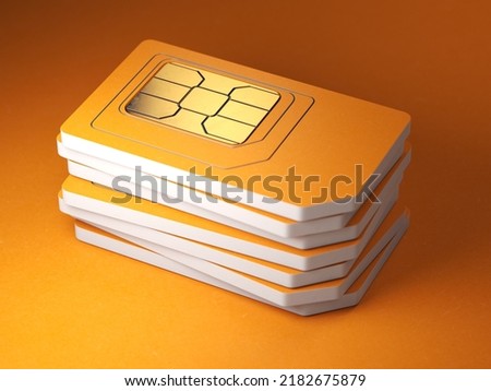 Stack of orange sim smart cards for mobile phone. 3d illustration