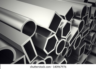 A stack of steel profiles in different shapes. They are designed to meet high demands for performance, quality and precision. They are used in construction and manufacturing.