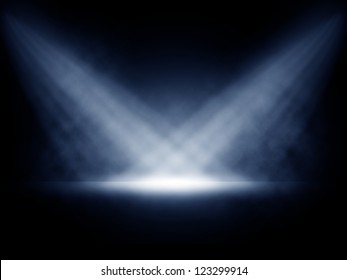 Stage lights with smoky effect background.