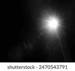 Star With Lens Flare. shiny sun, sunbeams, sunrays, sunshine design. Yellow warm light effect, sun rays, golden beams isolated on black background. star dust. black and white.