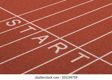 Starting Line As A Business Symbol Of The Metaphor Saying Ready Set Go For The Start Or Beginnings Of A Planned Strategy For Success As Represented By A Track And Field Stadium Background.