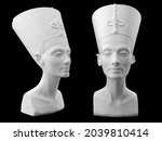 Statue of Nefertiti isolated on a black bakground. 3d image.